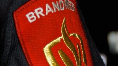 Auto in brand op de N383 bij Marsum