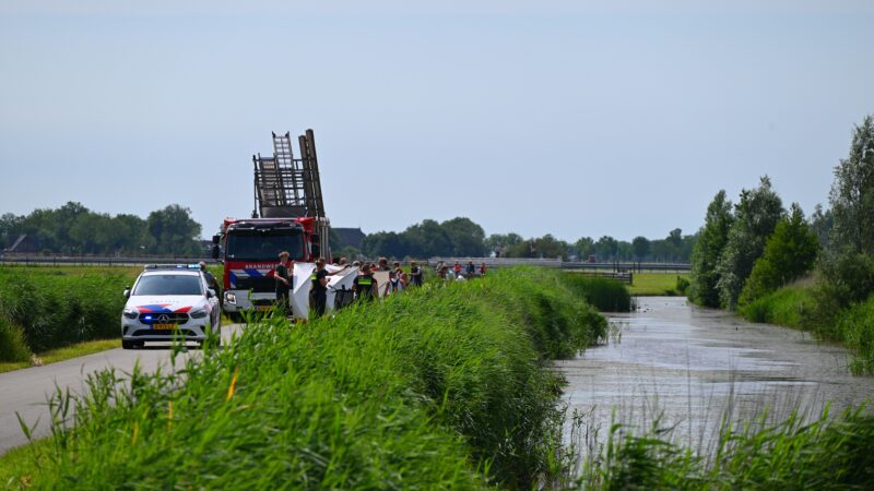 Persoon op driewielfiets te water in Jellum